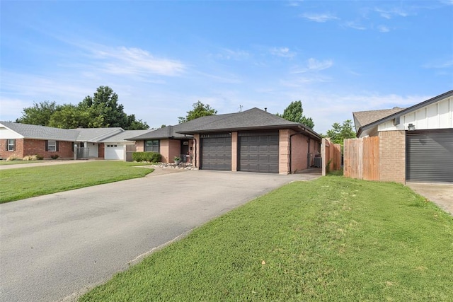 8316 NW 39th St, Bethany, OK 73008 - ranch-style house featuring a garage, brick siding, and driveway