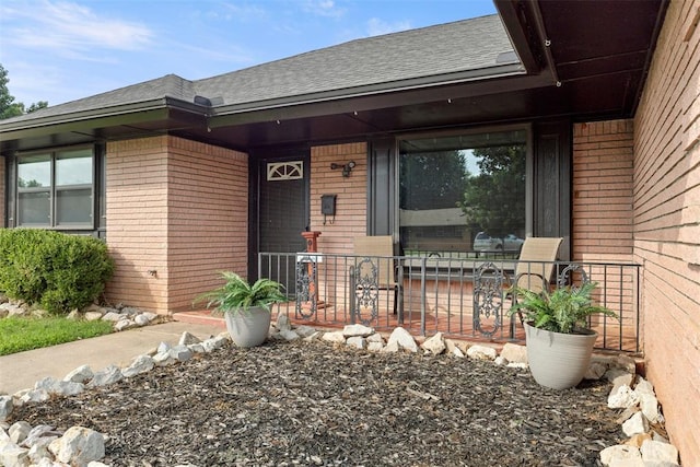 8316 NW 39th St, Bethany, OK 73008 - property entrance with brick siding and a shingled roof