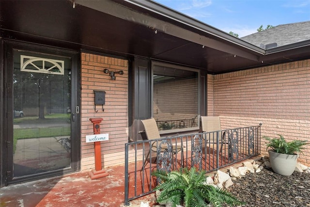 8316 NW 39th St, Bethany, OK 73008 - property entrance featuring brick siding and covered porch