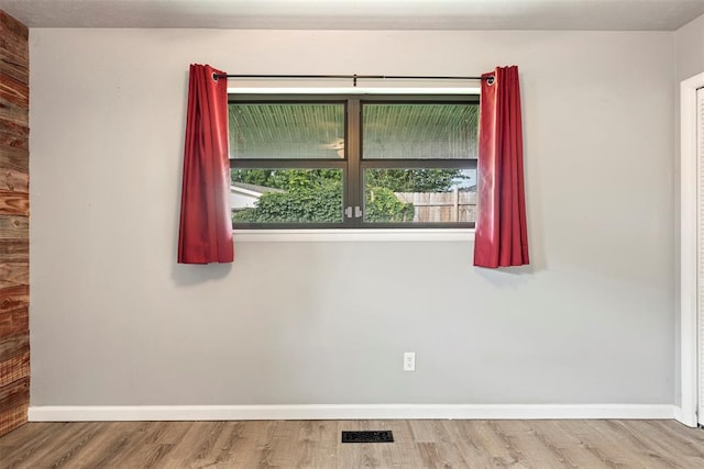 8316 NW 39th St, Bethany, OK 73008 - unfurnished room featuring baseboards and wood finished floors