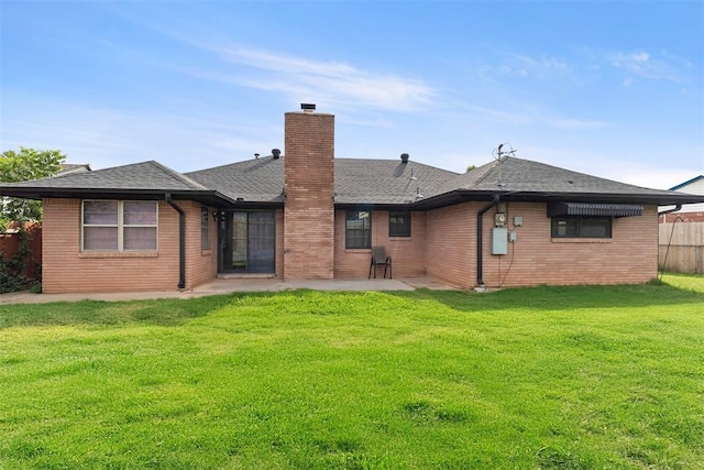 8316 NW 39th St, Bethany, OK 73008 - rear view of property with a patio, a chimney, brick siding, and a shingled roof
