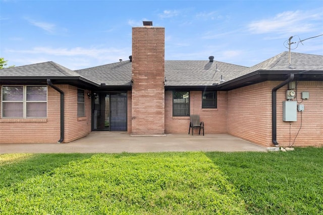 8316 NW 39th St, Bethany, OK 73008 - back of house featuring a patio area, a yard, and roof with shingles