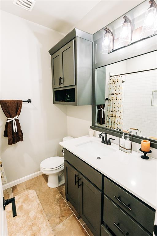 11501 SW 56th St, Mustang, OK 73064 - full bath with vanity and a shower with curtain