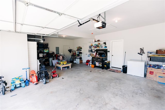 11501 SW 56th St, Mustang, OK 73064 - garage with a garage door opener, electric panel, and refrigerator