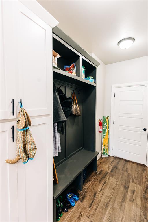 11501 SW 56th St, Mustang, OK 73064 - mudroom featuring wood finished floors