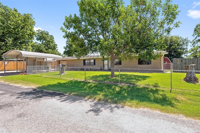 213 Meadowlark Ln, Fort Cobb, OK 73038 - view of front of property with a carport and a fenced front yard