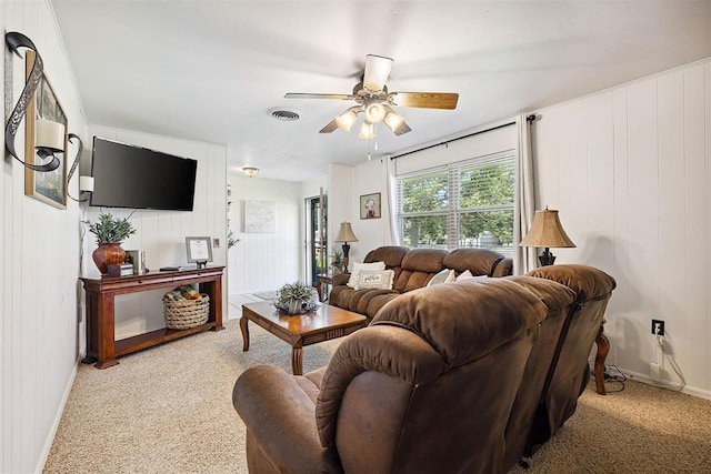213 Meadowlark Ln, Fort Cobb, OK 73038 - living room featuring a ceiling fan and light colored carpet