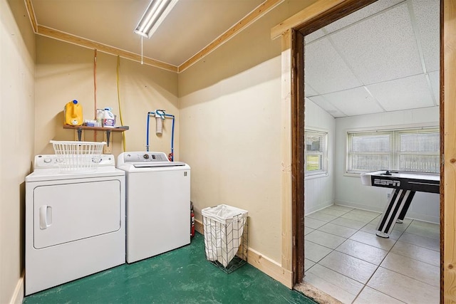 213 Meadowlark Ln, Fort Cobb, OK 73038 - washroom featuring washing machine and dryer and baseboards