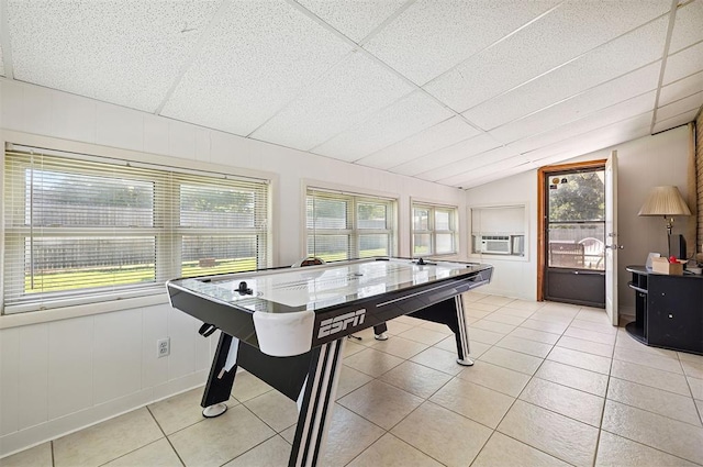 213 Meadowlark Ln, Fort Cobb, OK 73038 - playroom featuring lofted ceiling, light tile patterned flooring, and cooling unit