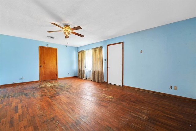 105 E E Walk, Canute, OK 73626 - unfurnished bedroom featuring hardwood / wood-style flooring and a ceiling fan