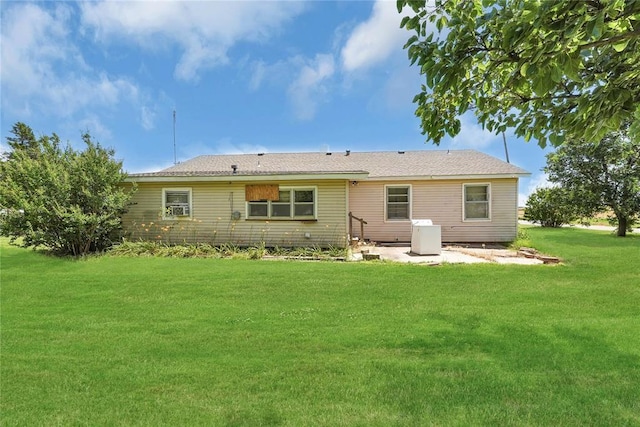 105 E E Walk, Canute, OK 73626 - back of house featuring a lawn and a patio area
