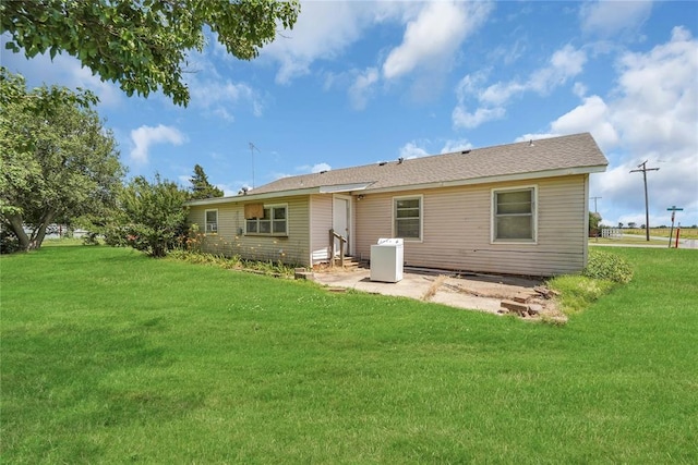 105 E E Walk, Canute, OK 73626 - back of house featuring a patio and a yard