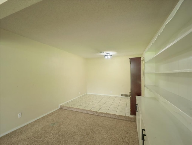 516 SW 63rd Ter, Oklahoma City, OK 73139 - carpeted empty room featuring baseboards and tile patterned flooring