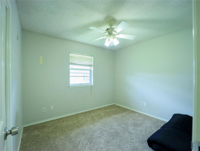516 SW 63rd Ter, Oklahoma City, OK 73139 - spare room featuring carpet floors, ceiling fan, and a textured ceiling