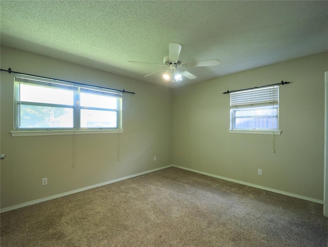 516 SW 63rd Ter, Oklahoma City, OK 73139 - carpeted empty room with plenty of natural light, ceiling fan, and a textured ceiling