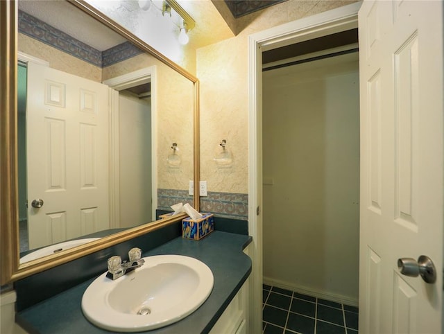 516 SW 63rd Ter, Oklahoma City, OK 73139 - bathroom with vanity and tile patterned flooring