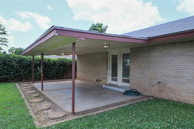 516 SW 63rd Ter, Oklahoma City, OK 73139 - view of patio / terrace with an attached carport