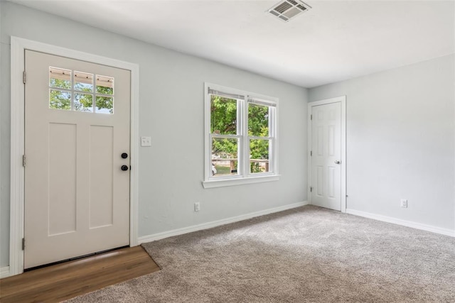 1436 NW 97th St, Oklahoma City, OK 73114 - entryway featuring plenty of natural light and carpet