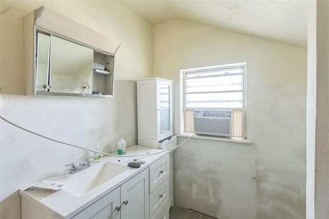 400 E Wagner Ave, Pauls Valley, OK 73075 - bathroom with vaulted ceiling, vanity, and cooling unit