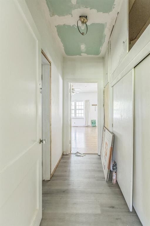400 E Wagner Ave, Pauls Valley, OK 73075 - corridor featuring light wood-type flooring
