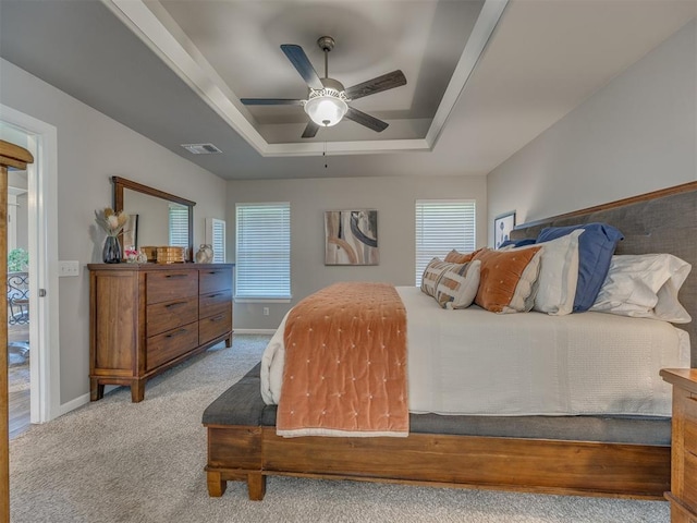 4116 Armstead Ave, Edmond, OK 73012 - bedroom featuring a raised ceiling, carpet floors, and ceiling fan