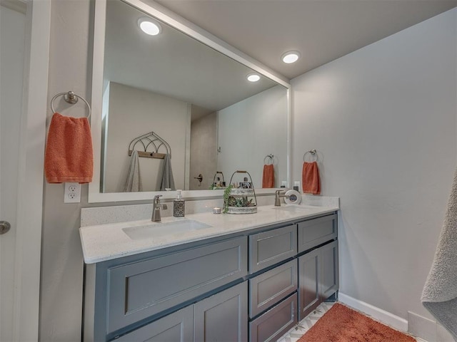4116 Armstead Ave, Edmond, OK 73012 - bathroom with double vanity and recessed lighting