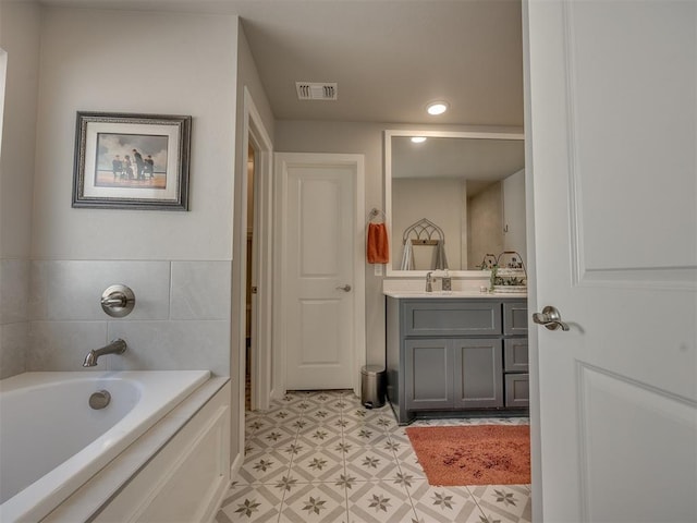 4116 Armstead Ave, Edmond, OK 73012 - full bath with vanity, a bath, tile patterned floors, and recessed lighting
