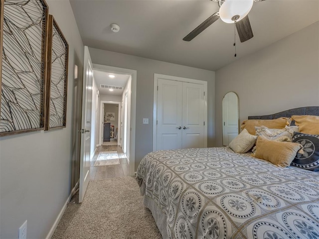 4116 Armstead Ave, Edmond, OK 73012 - bedroom with a closet, a ceiling fan, and light colored carpet