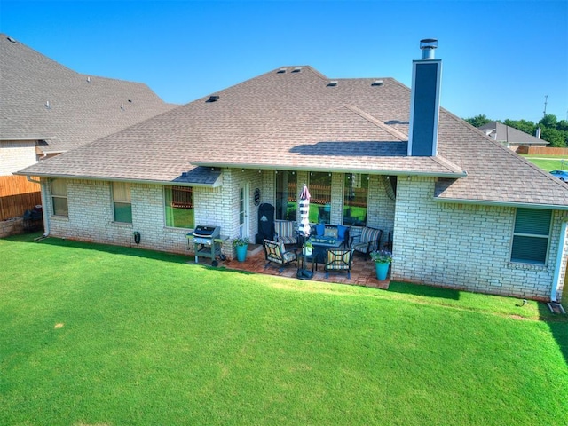 4116 Armstead Ave, Edmond, OK 73012 - back of property with brick siding, a shingled roof, a chimney, and a patio