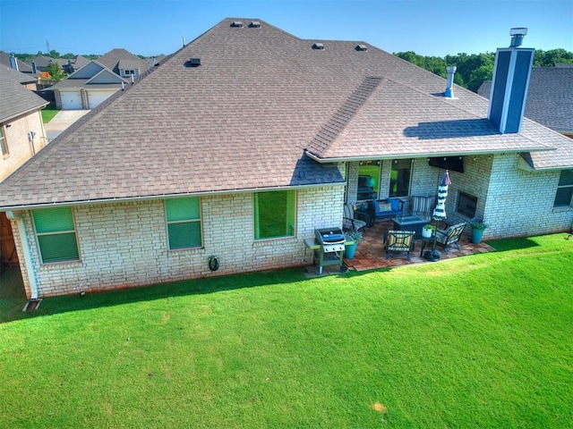 4116 Armstead Ave, Edmond, OK 73012 - back of property featuring a chimney, brick siding, a shingled roof, and a patio