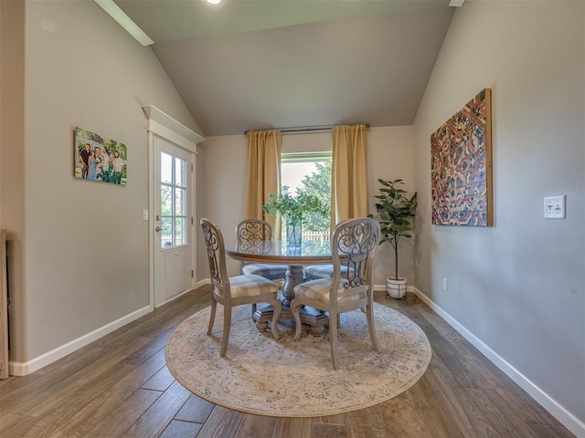 4116 Armstead Ave, Edmond, OK 73012 - dining room featuring lofted ceiling and wood finished floors