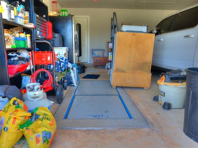 4116 Armstead Ave, Edmond, OK 73012 - garage with freestanding refrigerator