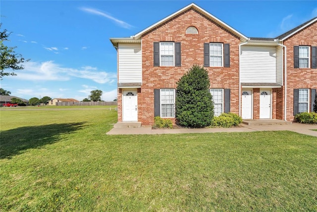1501 N Wade St, Sayre, OK 73662 - view of front of house with a front yard and brick siding