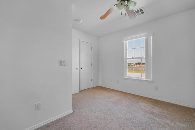 1501 N Wade St, Sayre, OK 73662 - carpeted spare room featuring ceiling fan and a smoke detector