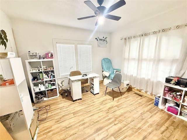 717 E Walnut St, Altus, OK 73521 - office area with wood finished floors and a ceiling fan