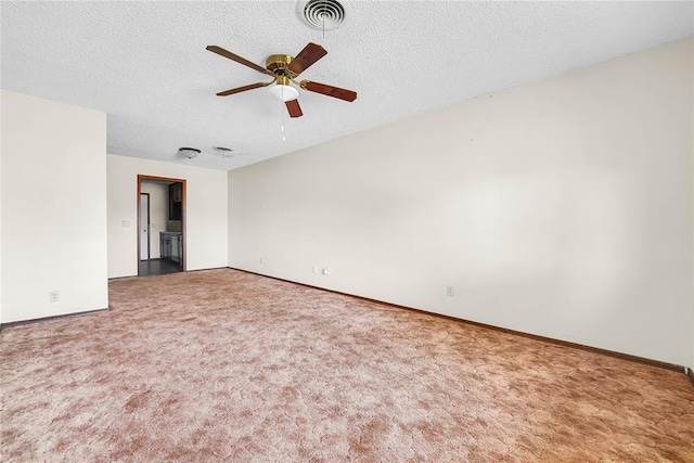 418 N Electra St, Sayre, OK 73662 - carpeted empty room with a ceiling fan and a textured ceiling