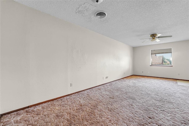 418 N Electra St, Sayre, OK 73662 - carpeted spare room featuring ceiling fan and a textured ceiling