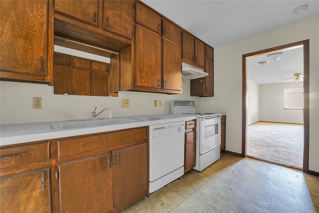 418 N Electra St, Sayre, OK 73662 - kitchen featuring white appliances, under cabinet range hood, ceiling fan, and light countertops