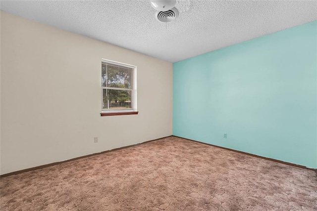 418 N Electra St, Sayre, OK 73662 - carpeted empty room with a textured ceiling and baseboards