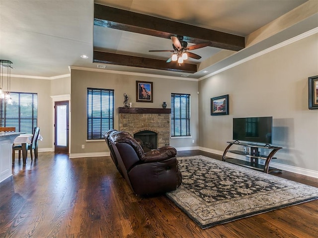 12105 SW 45th Ter, Mustang, OK 73064 - living room featuring wood finished floors, a stone fireplace, a ceiling fan, recessed lighting, and beam ceiling