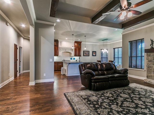 12105 SW 45th Ter, Mustang, OK 73064 - living area with dark wood-style flooring, ceiling fan, recessed lighting, beam ceiling, and crown molding