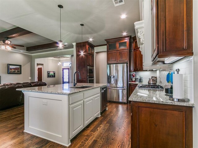12105 SW 45th Ter, Mustang, OK 73064 - kitchen featuring stainless steel appliances, open floor plan, dark wood-type flooring, glass insert cabinets, and a ceiling fan