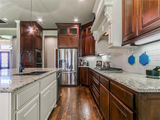 12105 SW 45th Ter, Mustang, OK 73064 - kitchen with stainless steel appliances, dark wood-style floors, tasteful backsplash, glass insert cabinets, and crown molding
