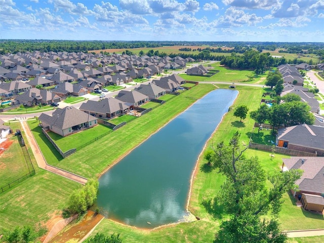 12105 SW 45th Ter, Mustang, OK 73064 - aerial perspective of suburban area with a nearby body of water