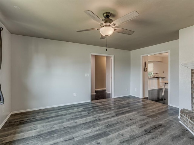 1713 SE 14th St, Moore, OK 73160 - unfurnished living room featuring ceiling fan and wood finished floors