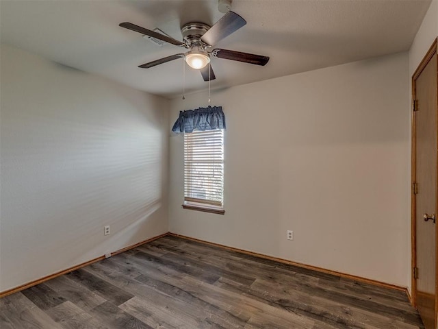 1713 SE 14th St, Moore, OK 73160 - empty room featuring a ceiling fan and wood finished floors