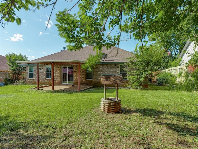 1713 SE 14th St, Moore, OK 73160 - rear view of property with a patio area, a shingled roof, brick siding, and a fenced backyard