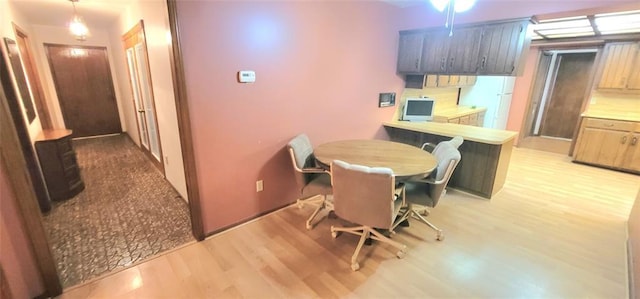 1117 Moose St, Yukon, OK 73099 - dining area featuring light wood-type flooring