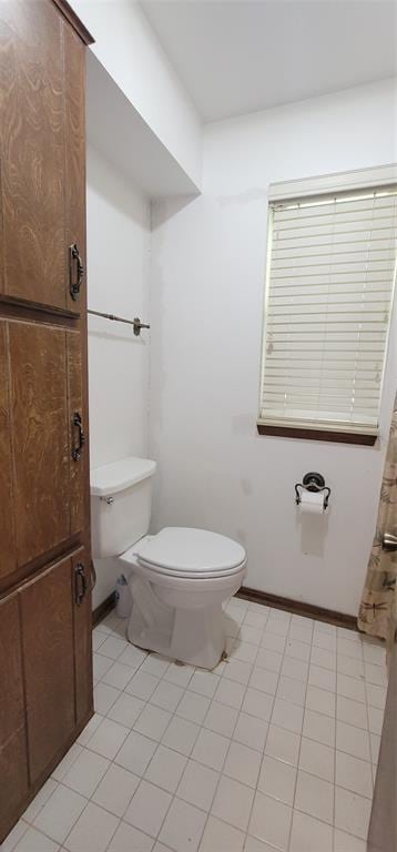 1117 Moose St, Yukon, OK 73099 - bathroom featuring toilet and tile patterned floors