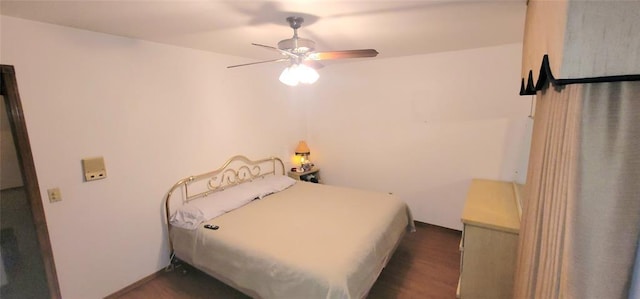 1117 Moose St, Yukon, OK 73099 - bedroom featuring a ceiling fan and dark wood-style flooring
